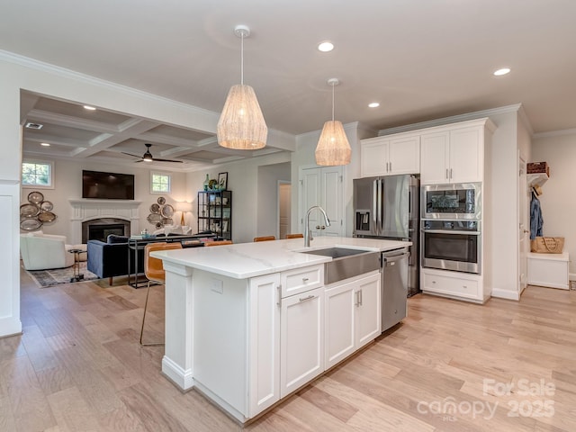143 Robinson Ridge Dr, Mooresville, NC 28117 - kitchen with crown molding, appliances with stainless steel finishes, a sink, and recessed lighting