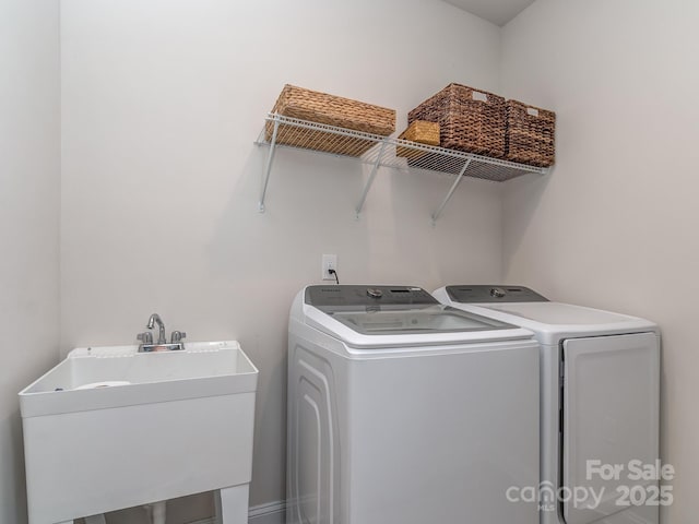 143 Robinson Ridge Dr, Mooresville, NC 28117 - laundry room with a sink, washing machine and dryer, and laundry area