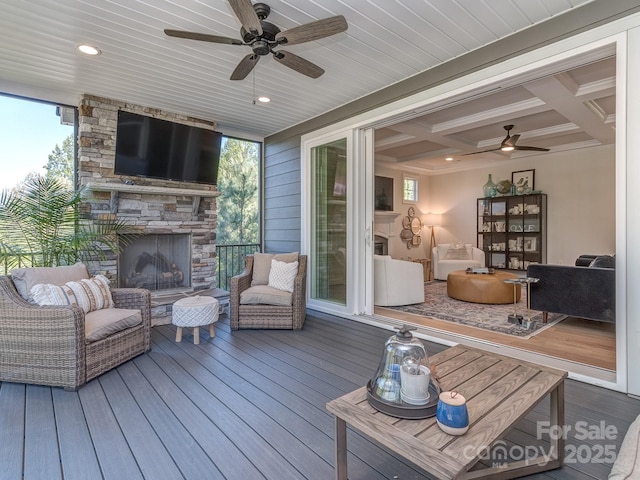 143 Robinson Ridge Dr, Mooresville, NC 28117 - exterior space with a ceiling fan and an outdoor stone fireplace
