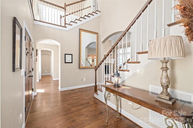 3005 Dream Catcher Cir, Fort Mill, SC 29715 - entryway with arched walkways, visible vents, wood finished floors, and stairway