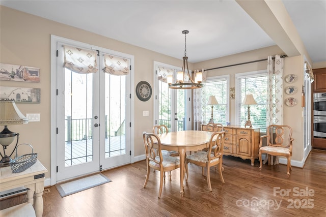 3005 Dream Catcher Cir, Fort Mill, SC 29715 - dining area featuring baseboards, an inviting chandelier, french doors, and wood finished floors