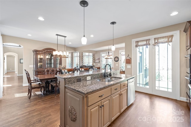 3005 Dream Catcher Cir, Fort Mill, SC 29715 - kitchen with pendant lighting, appliances with stainless steel finishes, a center island with sink, wood finished floors, and a sink