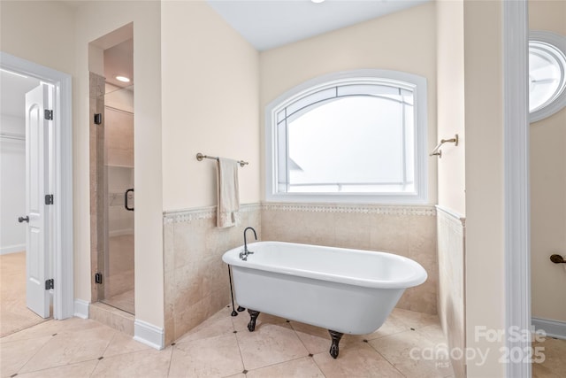 3005 Dream Catcher Cir, Fort Mill, SC 29715 - full bathroom featuring tile patterned floors, tile walls, a soaking tub, and a stall shower