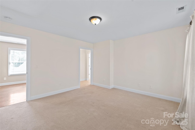 3005 Dream Catcher Cir, Fort Mill, SC 29715 - unfurnished room featuring baseboards, light colored carpet, and visible vents