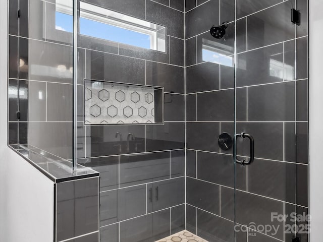 full bathroom with a shower stall