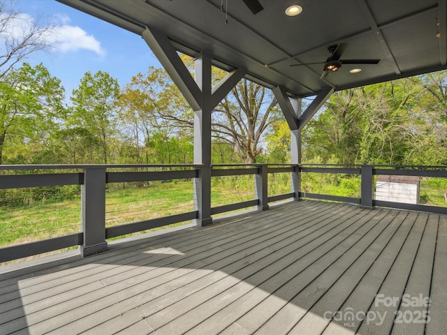 wooden deck with ceiling fan