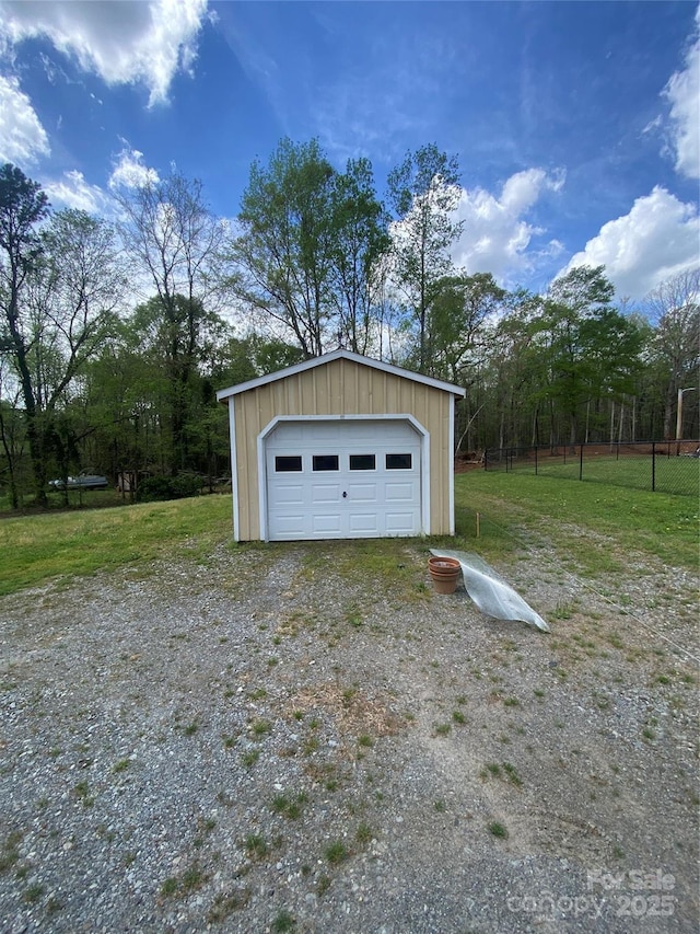 detached garage with fence