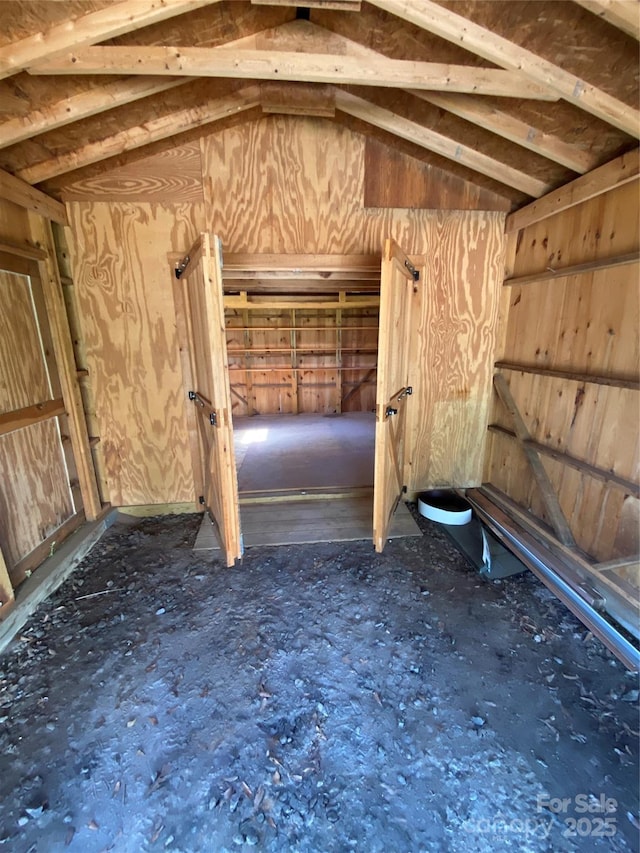 interior space featuring vaulted ceiling