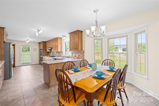 4896 Pageland Hwy, Lancaster, SC 29720 - dining room featuring a chandelier and light tile patterned floors