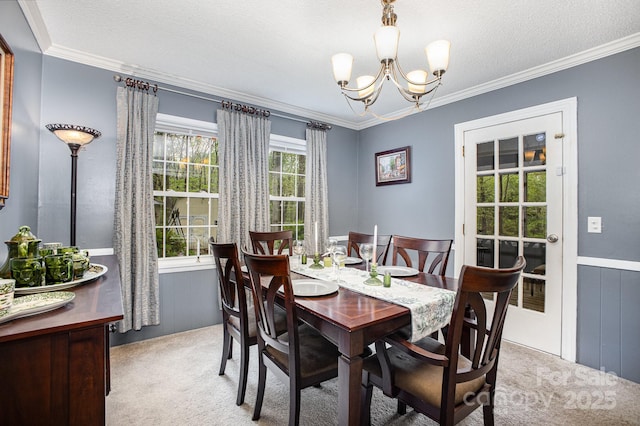 147 Spring Shore Rd, Statesville, NC 28677 - dining room with a chandelier, crown molding, carpet flooring, and a textured ceiling