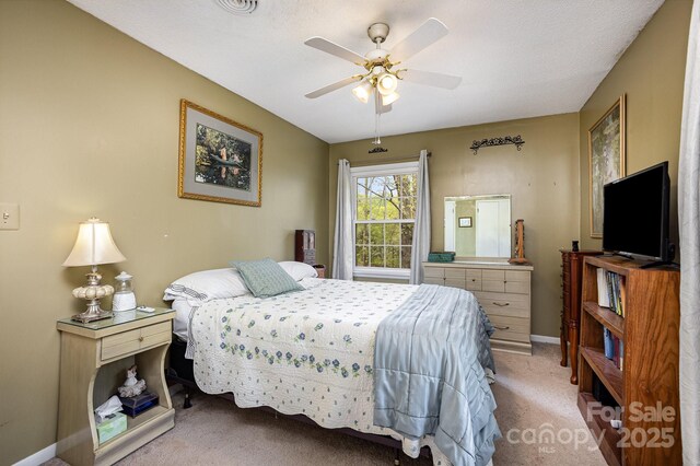 147 Spring Shore Rd, Statesville, NC 28677 - bedroom with carpet floors, ceiling fan, and baseboards