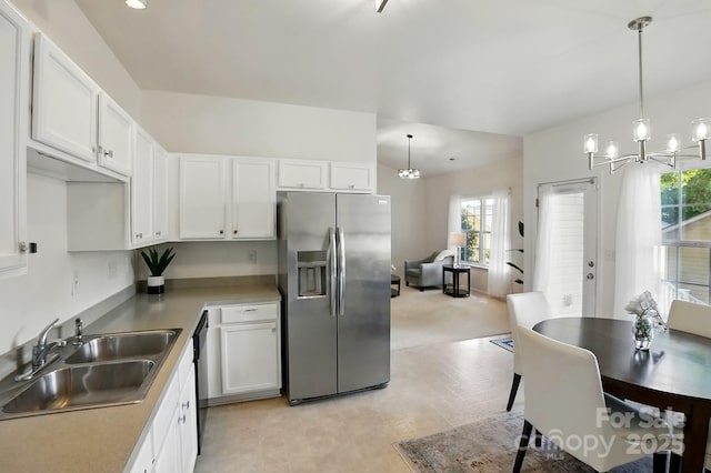 19416 Fridley Ln, Cornelius, NC 28031 - kitchen with stainless steel fridge with ice dispenser, a sink, white cabinetry, a chandelier, and recessed lighting