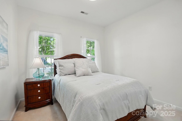 19416 Fridley Ln, Cornelius, NC 28031 - carpeted bedroom with multiple windows and baseboards