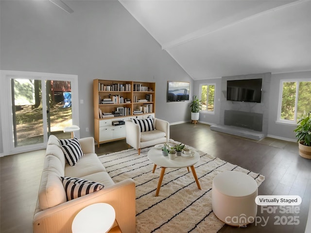 8000 Briardale Dr, Charlotte, NC 28212 - living area with wood finished floors, high vaulted ceiling, baseboards, and a fireplace