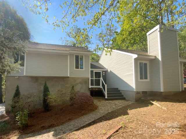 8000 Briardale Dr, Charlotte, NC 28212 - back of property featuring a chimney and a shingled roof