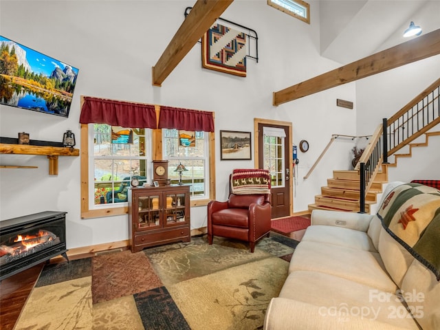 120 Ashley Ct, Mill Spring, NC 28756 - living room with a high ceiling, a healthy amount of sunlight, baseboards, and stairway