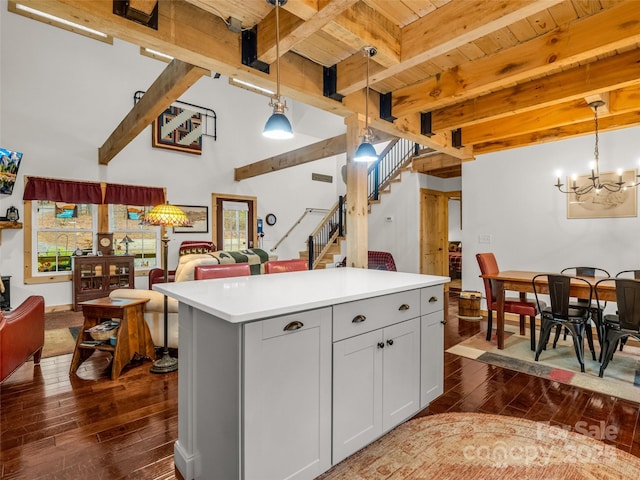 120 Ashley Ct, Mill Spring, NC 28756 - kitchen featuring wood ceiling, dark wood-style flooring, light countertops, open floor plan, and beam ceiling