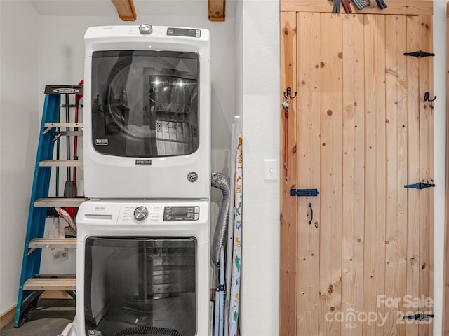 120 Ashley Ct, Mill Spring, NC 28756 - laundry area featuring stacked washing maching and dryer and laundry area