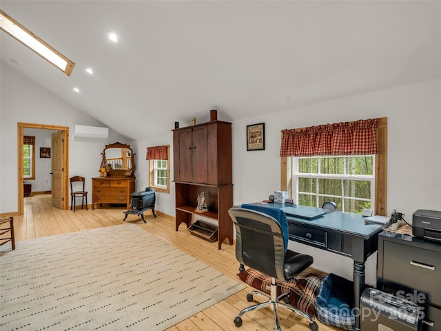120 Ashley Ct, Mill Spring, NC 28756 - home office with light wood-style flooring, a healthy amount of sunlight, and a wall mounted air conditioner