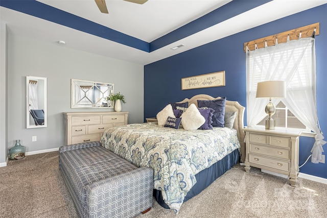 bedroom with carpet flooring, baseboards, visible vents, and ceiling fan