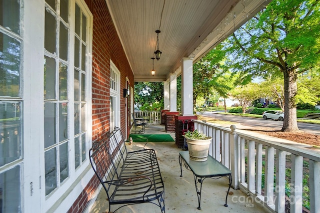 247 W Park Ave, Charlotte, NC 28203 - balcony featuring covered porch
