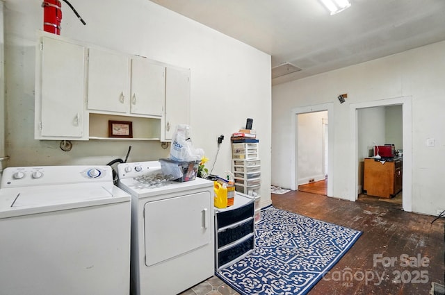 247 W Park Ave, Charlotte, NC 28203 - clothes washing area featuring wood-type flooring, separate washer and dryer, attic access, and cabinet space