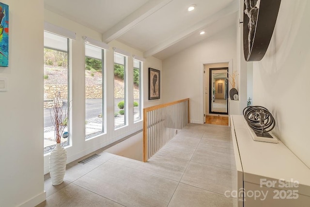hall with baseboards, vaulted ceiling with beams, recessed lighting, and visible vents