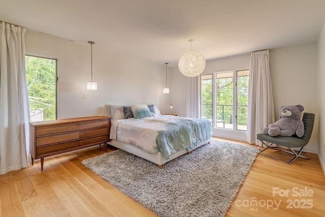 bedroom featuring light wood-type flooring