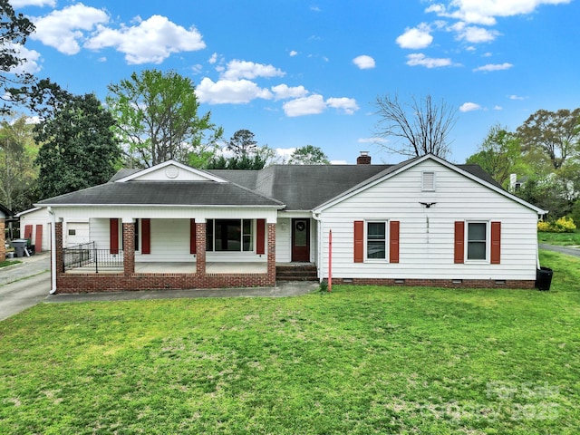 view of front of property with a chimney, crawl space, a front yard, a shingled roof, and covered porch