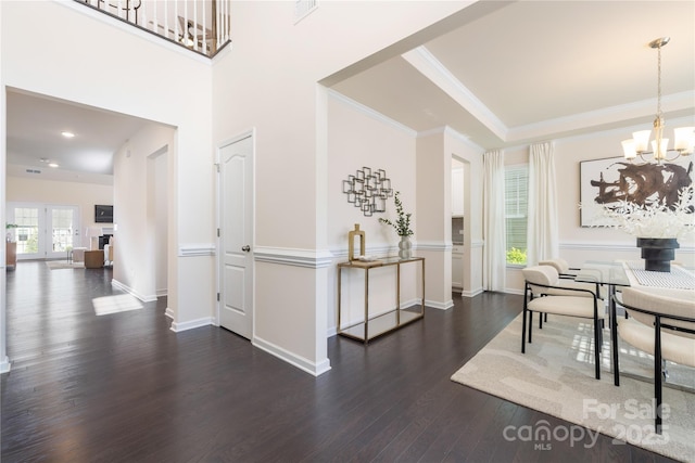 1005 Argentium Way, Waxhaw, NC 28173 - dining space with dark wood-type flooring, a chandelier, crown molding, and recessed lighting