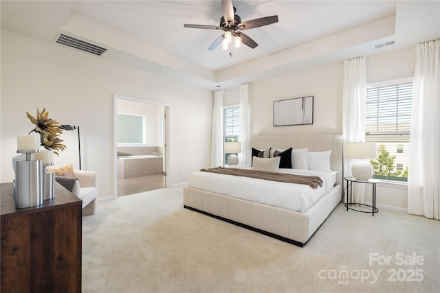 1005 Argentium Way, Waxhaw, NC 28173 - carpeted bedroom with baseboards and connected bathroom