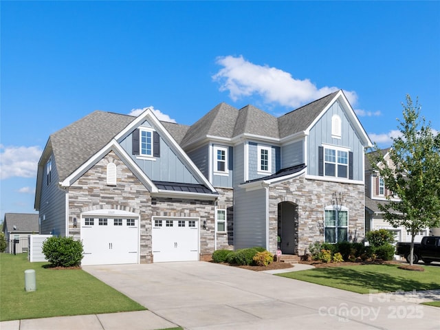 1005 Argentium Way, Waxhaw, NC 28173 - view of front of property with board and batten siding, concrete driveway, and stone siding