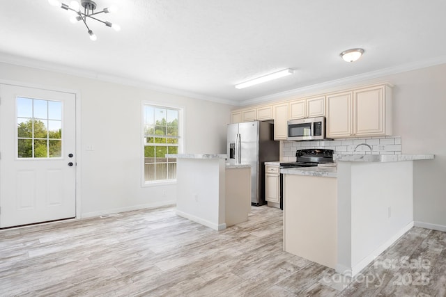 123 Pumice Dr, Statesville, NC 28625 - kitchen with appliances with stainless steel finishes, ornamental molding, plenty of natural light, cream cabinets, and light countertops