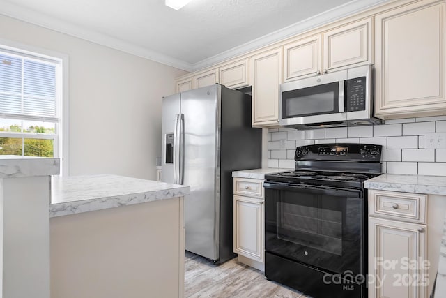 123 Pumice Dr, Statesville, NC 28625 - kitchen featuring appliances with stainless steel finishes, cream cabinetry, ornamental molding, backsplash, and light wood finished floors