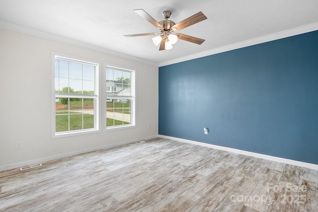 123 Pumice Dr, Statesville, NC 28625 - empty room featuring ornamental molding, wood finished floors, a ceiling fan, and baseboards