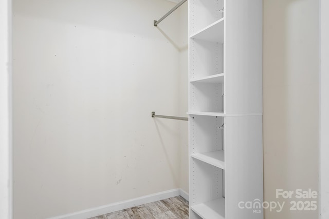 123 Pumice Dr, Statesville, NC 28625 - walk in closet featuring light wood-style flooring