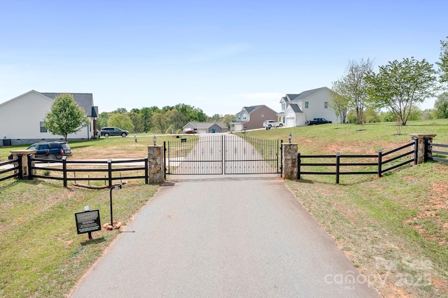 123 Pumice Dr, Statesville, NC 28625 - view of road with a gate and a residential view