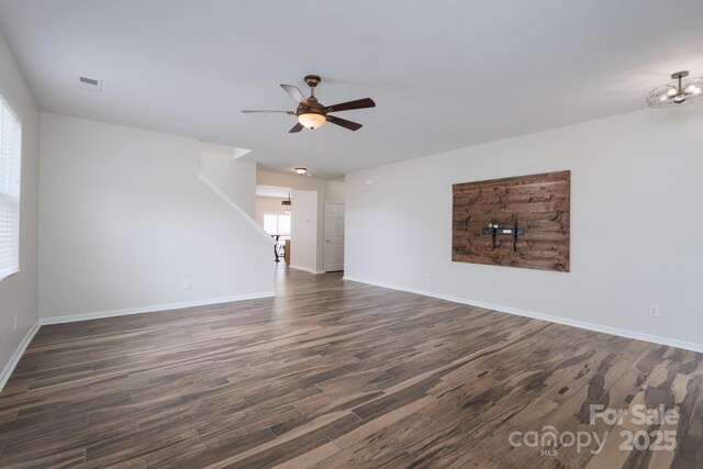 1144 Spicewood Pines Rd, Fort Mill, SC 29708 - unfurnished living room featuring a ceiling fan, healthy amount of natural light, dark wood-style floors, and baseboards