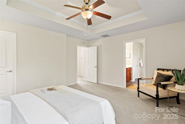 bedroom featuring visible vents, baseboards, a raised ceiling, crown molding, and light carpet