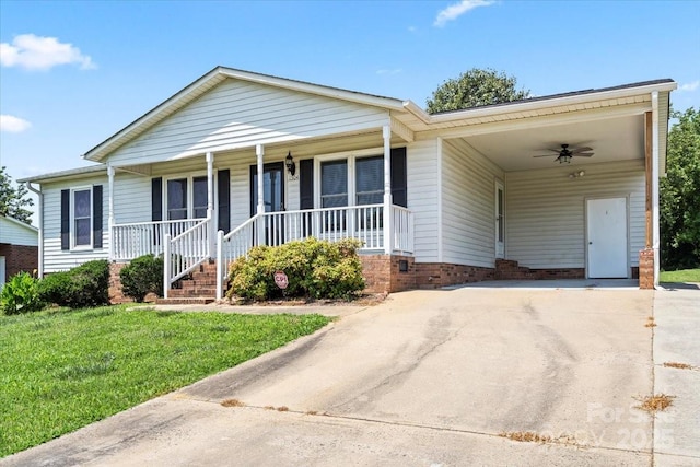1504 Andicot Ln, Shelby, NC 28152 - ranch-style home with driveway, a front lawn, a carport, and a porch