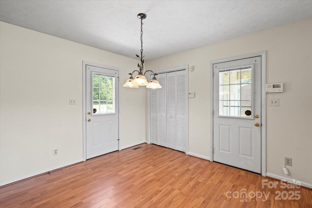 1504 Andicot Ln, Shelby, NC 28152 - entrance foyer with a chandelier and light wood finished floors