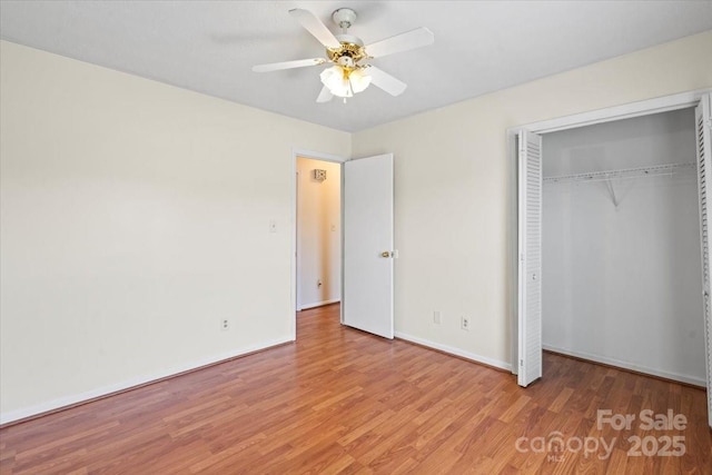 1504 Andicot Ln, Shelby, NC 28152 - unfurnished bedroom featuring wood finished floors, a closet, and a ceiling fan