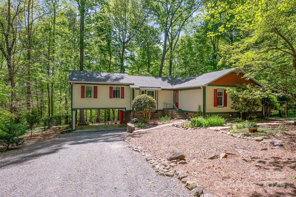 7230 Ridge Lane Rd, Charlotte, NC 28262 - view of front facade featuring a carport and driveway
