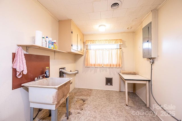 office featuring crown molding, electric panel, and visible vents