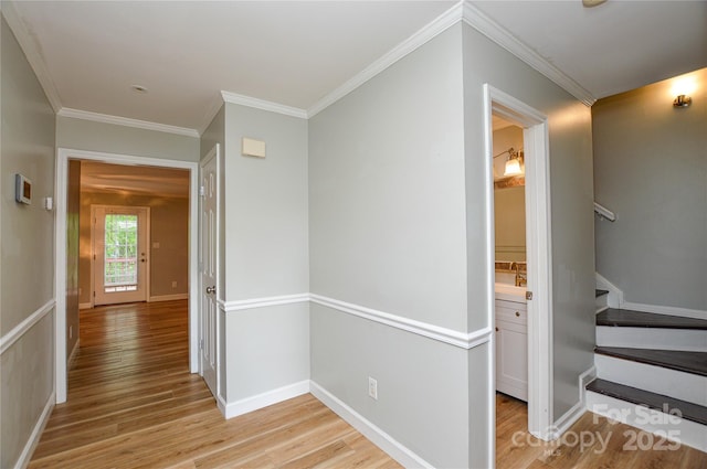 10805 Winterbourne Ct, Charlotte, NC 28277 - hall with baseboards, stairs, light wood-type flooring, and ornamental molding