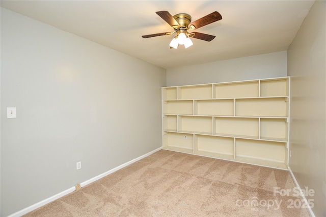 10805 Winterbourne Ct, Charlotte, NC 28277 - spare room featuring light carpet, baseboards, and a ceiling fan