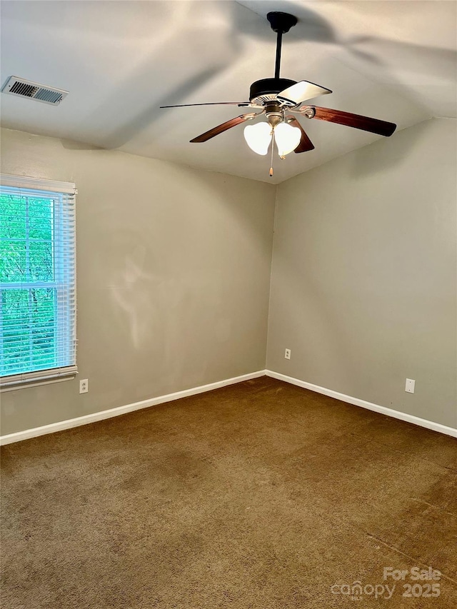 10805 Winterbourne Ct, Charlotte, NC 28277 - empty room with visible vents, baseboards, a ceiling fan, and dark colored carpet