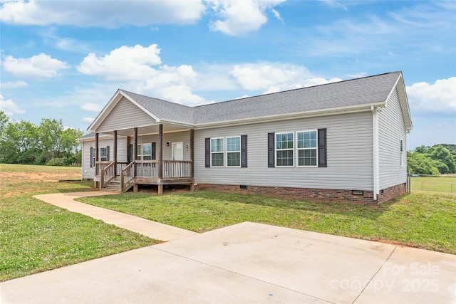 ranch-style home featuring a porch, fence, crawl space, a front lawn, and a shingled roof