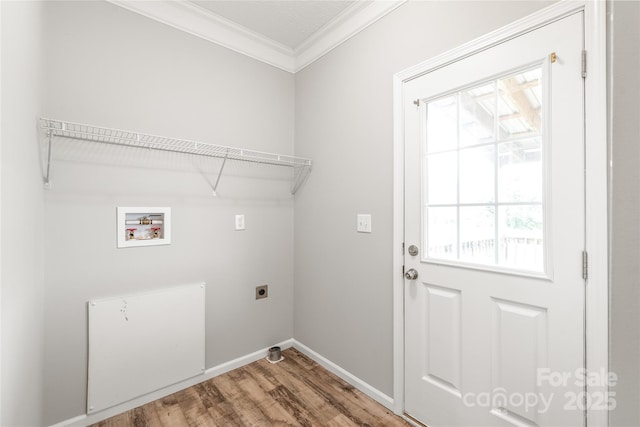 laundry room featuring wood finished floors, laundry area, crown molding, electric dryer hookup, and hookup for a washing machine