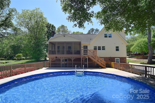 6008 Corkstone Dr, Mint Hill, NC 28227 - view of pool featuring a sunroom, a wooden deck, and stairs